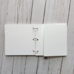 6x6 White Acrylic Memory Album, 3 binder rings, 7 pages, white cardstock. Pocket page, fold out page