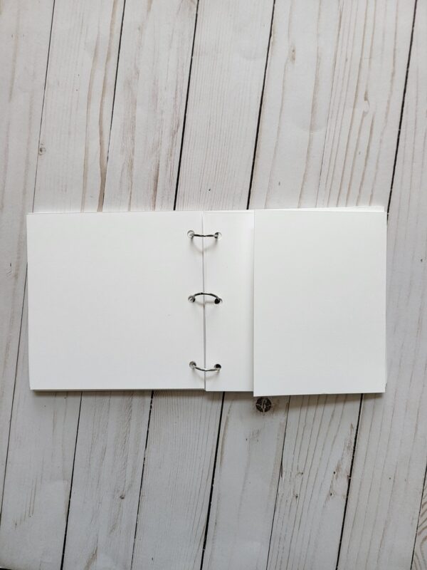 6x6 White Acrylic Memory Album, 3 binder rings, 7 pages, white cardstock. Pocket page, fold out page